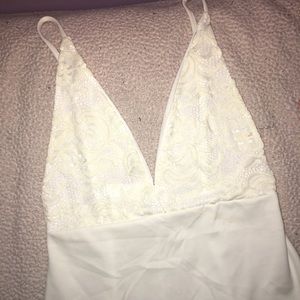 White plunge neckline low back dress